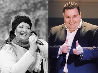 Eine Frau und ein Mann singen.