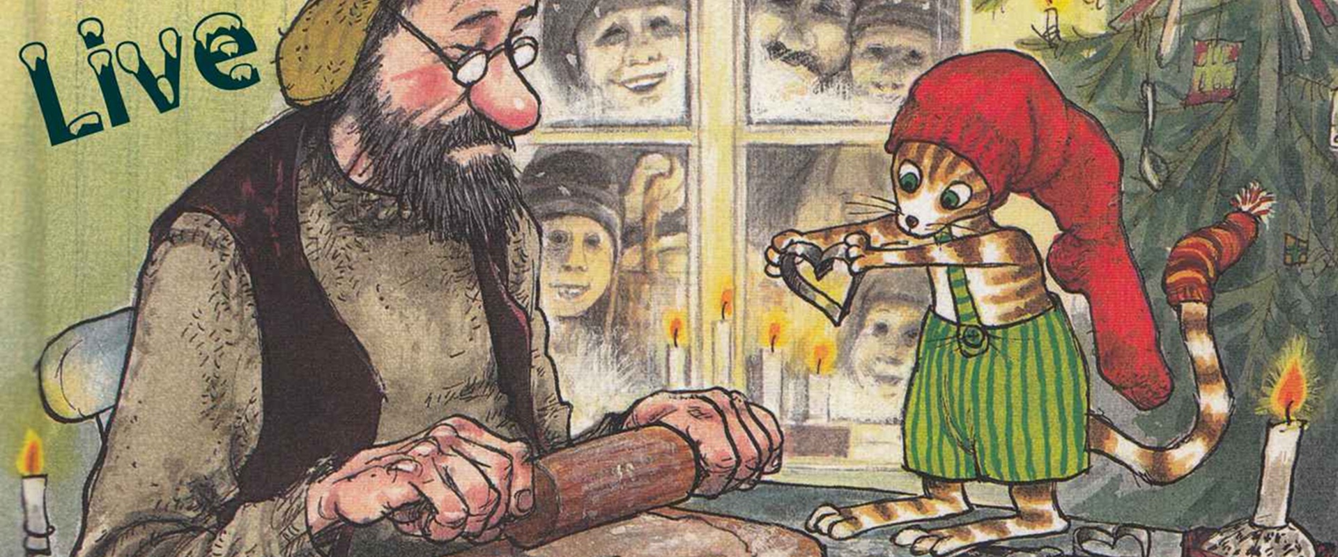 Ein alter Mann und ein Kater sitzen an einem Tisch.